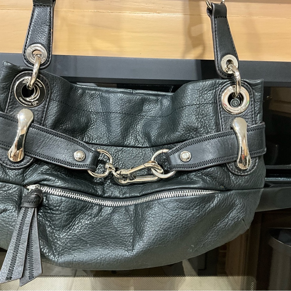 B. MAKOWSKY LONG BARREL SHOULDER STRAP BLACK LEATHER SATCHEL. 
13" LONG 9" WIDE